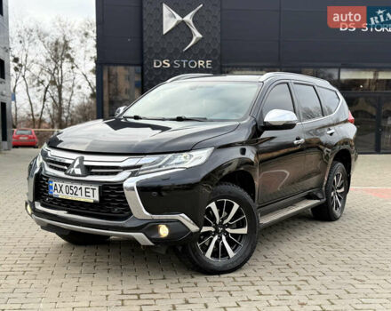 Чорний Міцубісі Паджеро Спорт, об'ємом двигуна 2.44 л та пробігом 119 тис. км за 19999 $, фото 1 на Automoto.ua