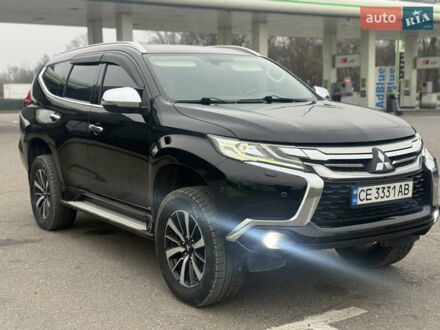 Чорний Міцубісі Паджеро Спорт, об'ємом двигуна 2.44 л та пробігом 135 тис. км за 22500 $, фото 1 на Automoto.ua