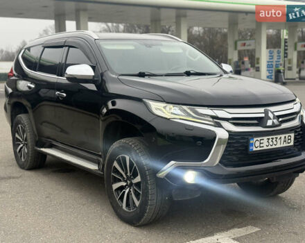Черный Мицубиси Паджеро Спорт, объемом двигателя 2.44 л и пробегом 135 тыс. км за 22500 $, фото 1 на Automoto.ua