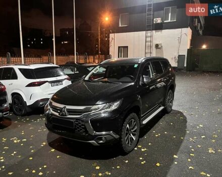 Черный Мицубиси Паджеро Спорт, объемом двигателя 2.44 л и пробегом 129 тыс. км за 23900 $, фото 1 на Automoto.ua