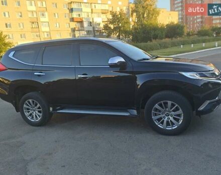 Чорний Міцубісі Паджеро Спорт, об'ємом двигуна 2.44 л та пробігом 95 тис. км за 19350 $, фото 1 на Automoto.ua
