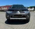 Коричневий Міцубісі Паджеро Спорт, об'ємом двигуна 2.5 л та пробігом 123 тис. км за 15200 $, фото 2 на Automoto.ua