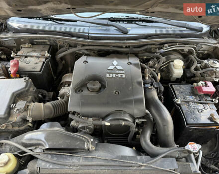 Коричневый Мицубиси Паджеро Спорт, объемом двигателя 2.48 л и пробегом 293 тыс. км за 16000 $, фото 3 на Automoto.ua