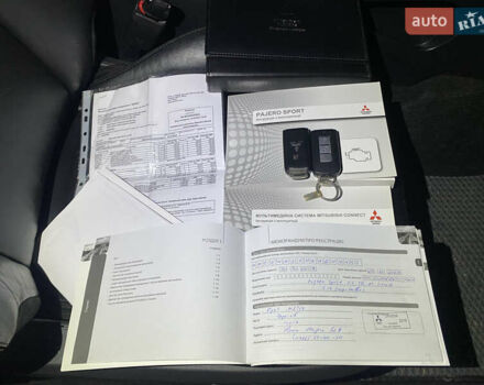 Коричневий Міцубісі Паджеро Спорт, об'ємом двигуна 2.44 л та пробігом 179 тис. км за 27500 $, фото 13 на Automoto.ua