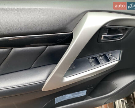 Коричневий Міцубісі Паджеро Спорт, об'ємом двигуна 2.44 л та пробігом 179 тис. км за 27500 $, фото 12 на Automoto.ua