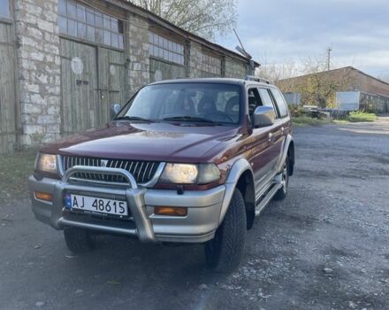 Червоний Міцубісі Паджеро Спорт, об'ємом двигуна 3 л та пробігом 350 тис. км за 3500 $, фото 2 на Automoto.ua