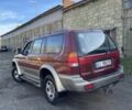 Червоний Міцубісі Паджеро Спорт, об'ємом двигуна 3 л та пробігом 350 тис. км за 3500 $, фото 4 на Automoto.ua