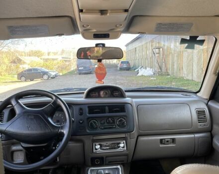 Червоний Міцубісі Паджеро Спорт, об'ємом двигуна 3 л та пробігом 350 тис. км за 3500 $, фото 6 на Automoto.ua