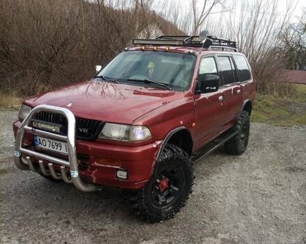 Красный Мицубиси Паджеро Спорт, объемом двигателя 3 л и пробегом 438 тыс. км за 6500 $, фото 1 на Automoto.ua