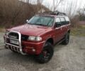 Красный Мицубиси Паджеро Спорт, объемом двигателя 3 л и пробегом 438 тыс. км за 6500 $, фото 1 на Automoto.ua