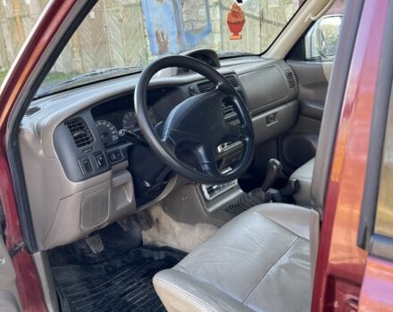 Червоний Міцубісі Паджеро Спорт, об'ємом двигуна 3 л та пробігом 350 тис. км за 3500 $, фото 7 на Automoto.ua