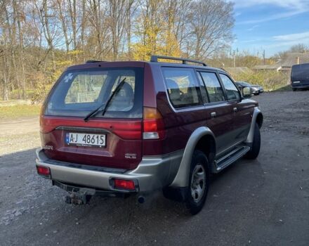 Червоний Міцубісі Паджеро Спорт, об'ємом двигуна 3 л та пробігом 350 тис. км за 3500 $, фото 3 на Automoto.ua