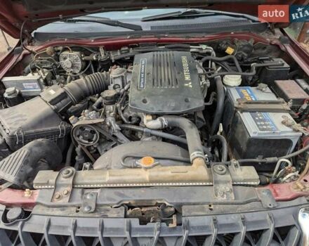 Мицубиси Паджеро Спорт 2000 в Чернигове на Automoto.ua Красный Мицубиси Паджеро Спорт, объемом двигателя 2.97 л и пробегом 311 тыс. км за 5700 $, фото 4 на Automoto.ua