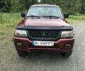 Красный Мицубиси Паджеро Спорт, объемом двигателя 3 л и пробегом 350 тыс. км за 5500 $, фото 11 на Automoto.ua