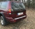 Красный Мицубиси Паджеро Спорт, объемом двигателя 3 л и пробегом 350 тыс. км за 5500 $, фото 1 на Automoto.ua