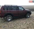 Красный Мицубиси Паджеро Спорт, объемом двигателя 3 л и пробегом 350 тыс. км за 5500 $, фото 1 на Automoto.ua