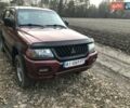 Красный Мицубиси Паджеро Спорт, объемом двигателя 3 л и пробегом 350 тыс. км за 5500 $, фото 2 на Automoto.ua