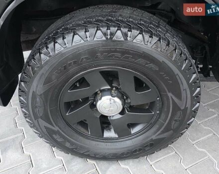 Красный Мицубиси Паджеро Спорт, объемом двигателя 3 л и пробегом 155 тыс. км за 5777 $, фото 18 на Automoto.ua