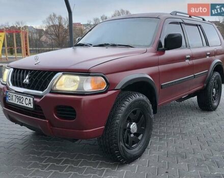 Красный Мицубиси Паджеро Спорт, объемом двигателя 3 л и пробегом 155 тыс. км за 5777 $, фото 5 на Automoto.ua
