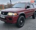 Красный Мицубиси Паджеро Спорт, объемом двигателя 3 л и пробегом 155 тыс. км за 5777 $, фото 5 на Automoto.ua