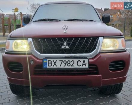 Красный Мицубиси Паджеро Спорт, объемом двигателя 3 л и пробегом 155 тыс. км за 5777 $, фото 4 на Automoto.ua