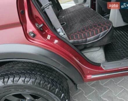 Красный Мицубиси Паджеро Спорт, объемом двигателя 3 л и пробегом 155 тыс. км за 5777 $, фото 28 на Automoto.ua