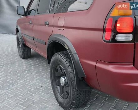 Красный Мицубиси Паджеро Спорт, объемом двигателя 3 л и пробегом 155 тыс. км за 5777 $, фото 16 на Automoto.ua