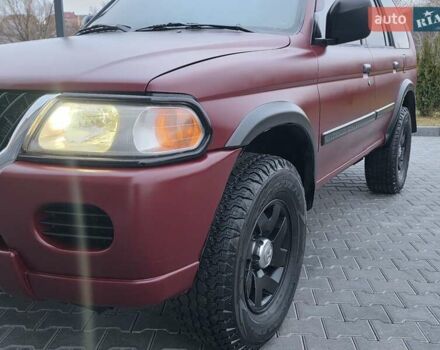 Красный Мицубиси Паджеро Спорт, объемом двигателя 3 л и пробегом 155 тыс. км за 5777 $, фото 15 на Automoto.ua