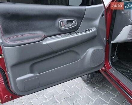 Красный Мицубиси Паджеро Спорт, объемом двигателя 3 л и пробегом 155 тыс. км за 5777 $, фото 42 на Automoto.ua