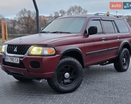Красный Мицубиси Паджеро Спорт, объемом двигателя 3 л и пробегом 155 тыс. км за 5777 $, фото 1 на Automoto.ua