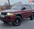Красный Мицубиси Паджеро Спорт, объемом двигателя 3 л и пробегом 155 тыс. км за 5777 $, фото 1 на Automoto.ua