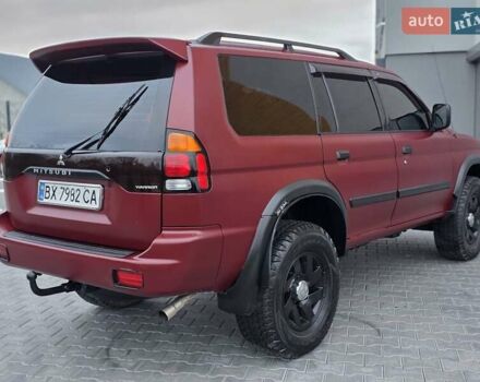 Красный Мицубиси Паджеро Спорт, объемом двигателя 3 л и пробегом 155 тыс. км за 5777 $, фото 3 на Automoto.ua