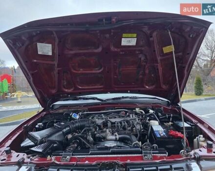 Красный Мицубиси Паджеро Спорт, объемом двигателя 3 л и пробегом 155 тыс. км за 5777 $, фото 24 на Automoto.ua