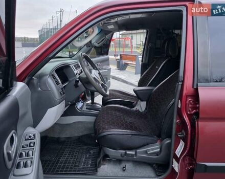 Красный Мицубиси Паджеро Спорт, объемом двигателя 3 л и пробегом 155 тыс. км за 5777 $, фото 44 на Automoto.ua