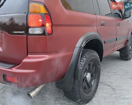 Красный Мицубиси Паджеро Спорт, объемом двигателя 3 л и пробегом 155 тыс. км за 5777 $, фото 17 на Automoto.ua