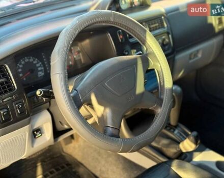 Червоний Міцубісі Паджеро Спорт, об'ємом двигуна 2.97 л та пробігом 212 тис. км за 6999 $, фото 7 на Automoto.ua