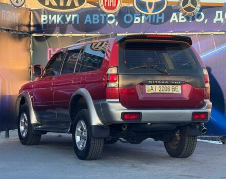 Червоний Міцубісі Паджеро Спорт, об'ємом двигуна 3 л та пробігом 212 тис. км за 6999 $, фото 6 на Automoto.ua