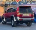 Червоний Міцубісі Паджеро Спорт, об'ємом двигуна 3 л та пробігом 212 тис. км за 6999 $, фото 6 на Automoto.ua