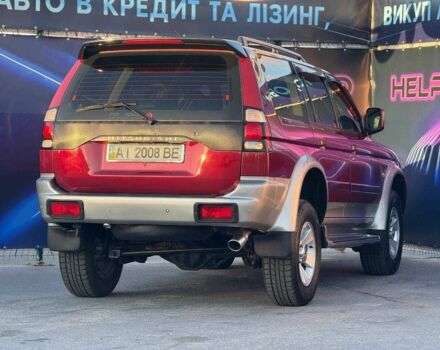 Червоний Міцубісі Паджеро Спорт, об'ємом двигуна 3 л та пробігом 212 тис. км за 6999 $, фото 5 на Automoto.ua
