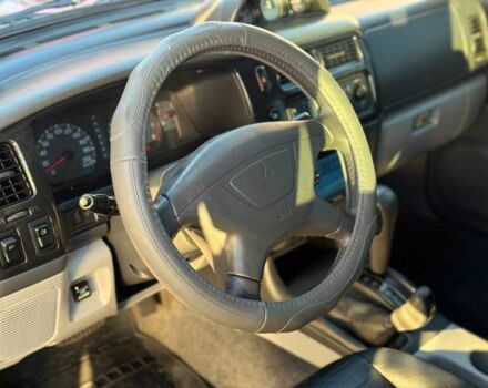 Червоний Міцубісі Паджеро Спорт, об'ємом двигуна 3 л та пробігом 212 тис. км за 6999 $, фото 7 на Automoto.ua