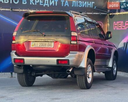Червоний Міцубісі Паджеро Спорт, об'ємом двигуна 2.97 л та пробігом 212 тис. км за 6999 $, фото 5 на Automoto.ua