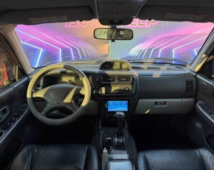 Червоний Міцубісі Паджеро Спорт, об'ємом двигуна 3 л та пробігом 212 тис. км за 6999 $, фото 9 на Automoto.ua