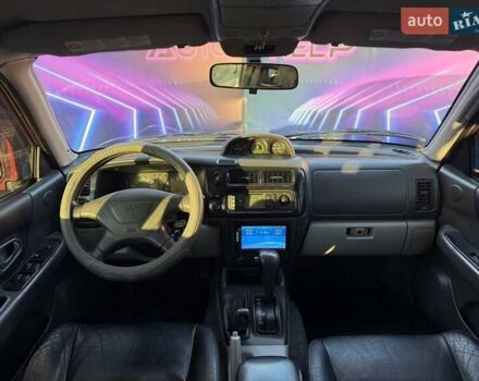 Червоний Міцубісі Паджеро Спорт, об'ємом двигуна 2.97 л та пробігом 212 тис. км за 6999 $, фото 9 на Automoto.ua