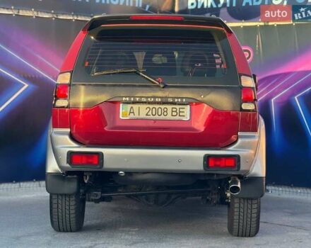 Червоний Міцубісі Паджеро Спорт, об'ємом двигуна 2.97 л та пробігом 212 тис. км за 6999 $, фото 4 на Automoto.ua