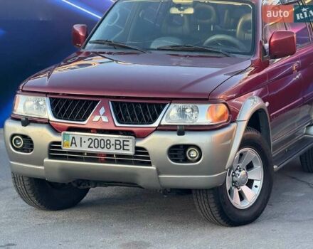 Червоний Міцубісі Паджеро Спорт, об'ємом двигуна 2.97 л та пробігом 212 тис. км за 6999 $, фото 1 на Automoto.ua
