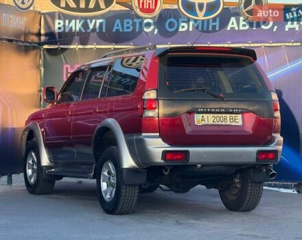 Червоний Міцубісі Паджеро Спорт, об'ємом двигуна 2.97 л та пробігом 212 тис. км за 6999 $, фото 6 на Automoto.ua