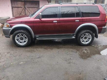 Красный Мицубиси Паджеро Спорт, объемом двигателя 3 л и пробегом 230 тыс. км за 5440 $, фото 1 на Automoto.ua