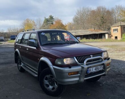 Красный Мицубиси Паджеро Спорт, объемом двигателя 3 л и пробегом 350 тыс. км за 3500 $, фото 1 на Automoto.ua