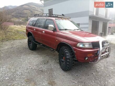 Красный Мицубиси Паджеро Спорт, объемом двигателя 3 л и пробегом 438 тыс. км за 6500 $, фото 1 на Automoto.ua