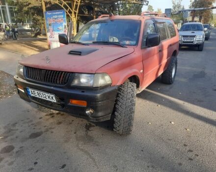 Червоний Міцубісі Паджеро Спорт, об'ємом двигуна 3 л та пробігом 300 тис. км за 4200 $, фото 1 на Automoto.ua